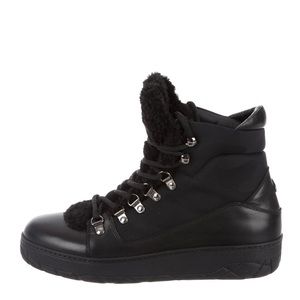 Moncler leather and shearling ankle boots.
